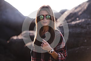 Outdoor fashion image of stylish young lady,fashionable.Lifestyle portrait of stunning hipster girl, wearing elegant