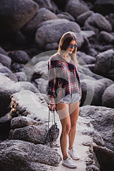 Outdoor fashion image of stylish young lady,fashionable.Lifestyle portrait of stunning hipster girl, wearing elegant