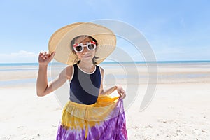 Outdoor fashion photo of cute happy girl at sea,beach travel