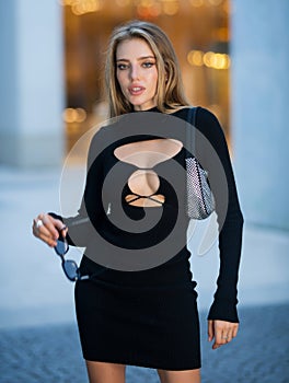 Outdoor fashion portrait of glamour sensual young stylish woamn wearing trendy summer outfit. Fashion outdoor portrait