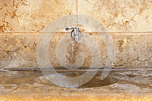 Outdoor faucet and a sink outdoors in Jerusalem, israel