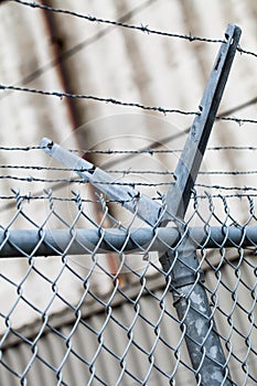 Outdoor Fence Detail of Sharp Barbwire Installation