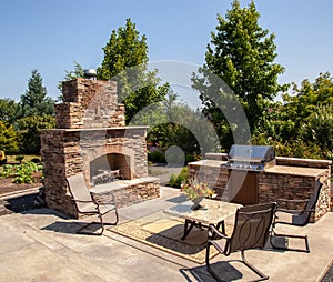 Outdoor fireplace and kitchen area Summer