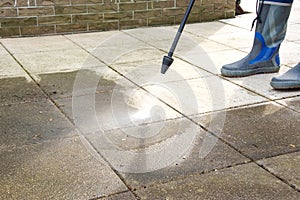 Outdoor floor cleaning with high pressure water jet