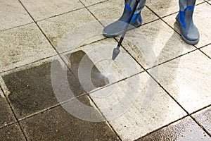 Outdoor floor cleaning with high pressure water jet