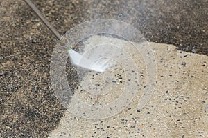 Outdoor floor cleaning with high pressure water jet