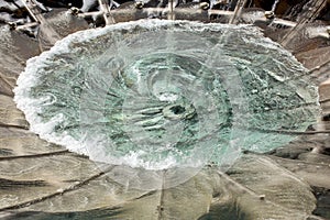 Outdoor fountain of glass with water in motion
