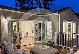 Outdoor furniture patio / wooden deck at twilight.