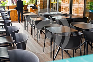Outdoor furniture in the on-site restaurant, tables and chairs