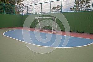 Outdoor futsal court at noon