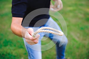 Outdoor games - guy playing ring toss in a park