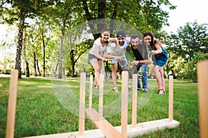 Outdoor games - ring toss. Game ring toss in a summer park