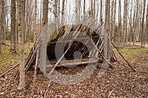 Outdoor hand built shelter in the woods