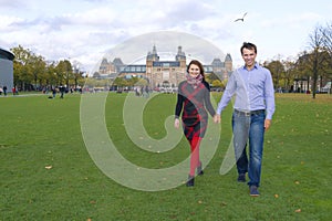 Outdoor happy couple in love, Museum Plein, autumn Amsterdam