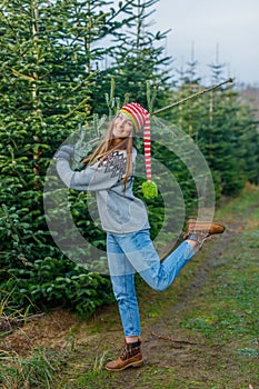 Outdoor Happy Family Choosing Christmas Tree Together