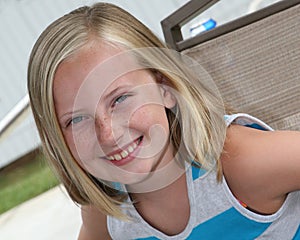 Outdoor head shot of a 9 year old girl