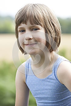 Outdoor Head And Shoulders Portrait Of Girl