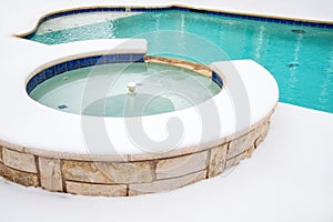 Outdoor hot tub in the winter photo