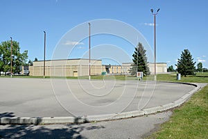 Outdoor ice skating and hockey rink empty in summer.