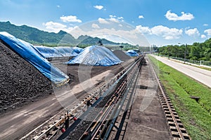 Outdoor incline large conveyor with rubber belt conveyor for transportation line for processing the coal in the coal mine.