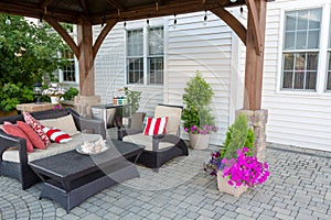 Outdoor living space on a brick patio photo