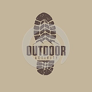 Outdoor logo idea with boot track and mountain photo