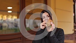 Outdoor meal, Burger moment, Dark-haired consumer