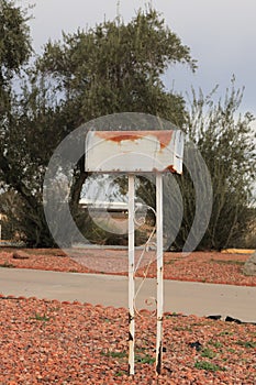Outdoor Metal Mail Box Covered in Rust