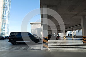 Outdoor parking lot with cars on sunny day