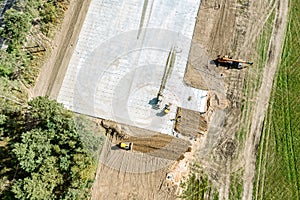 Outdoor parking lot in suburban neighborhood under construction. aerial top view