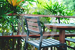 Outdoor patio chair and table. Outdoor wooden patio chair and table