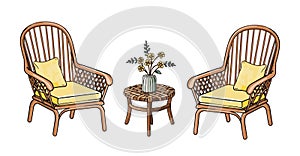 Outdoor patio furniture rattan armchair and table.