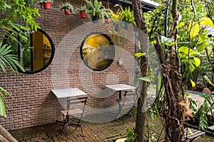 Outdoor patio seat and table of coffee shop garden