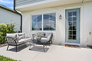 Outdoor patio seating area in the backyard