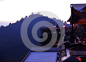 Outdoor peaceful place at the balcony of Resturant with mountains in the Winter background.