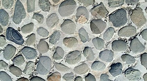 Outdoor pebble floor, massage stone walkway texture concrete wall brown floor old background decorative small stone texture