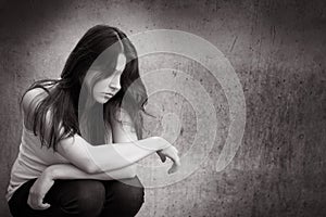 Outdoor photo of a sad anonymous girl thoughtful about troubles