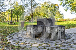 An outdoor picnic area spot with a charcoal barbecue installed in Bundek city park, Zagreb, Croatia