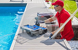 Outdoor Pool Maintenance Service Worker