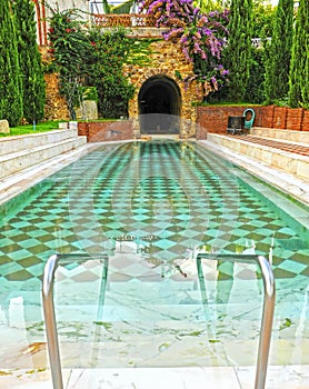 The outdoor pool of the spa of Alange -Balneario- famous thermal bath in the province of Badajoz, Spain photo