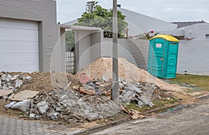 Outdoor portable crapper on a building site