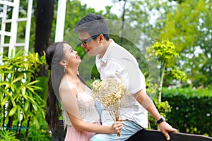 Outdoor portrait of asian young couple