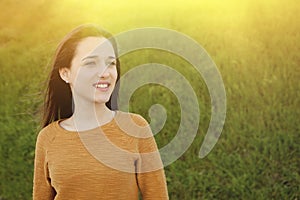 Outdoor portrait of beautiful happy teenager girl laughing