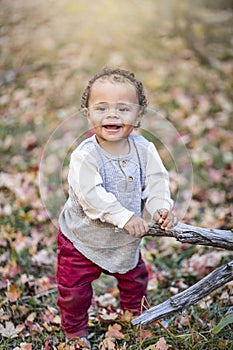 Outdoor Portrait of a beautiful smiling mixed race little boy