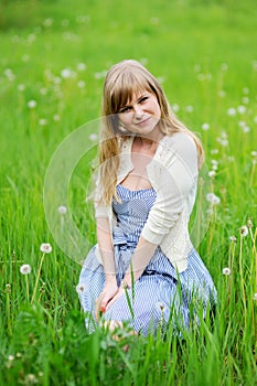 Outdoor portrait of beautiful young blond woman