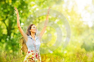 Outdoor Portrait of Beautiful Young Woman in Nature. Happy Girl Raised Arms Up in Summer Park