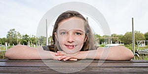 portrait of a cute little child girl during vactions photo