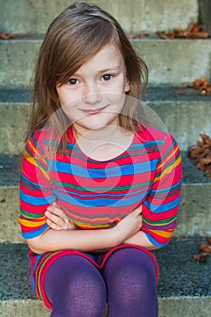 Outdoor portrait of a cute little girl