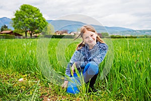 Outdoor portrait of a cute little girl