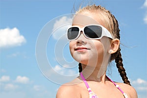 Outdoor portrait of cute little girl